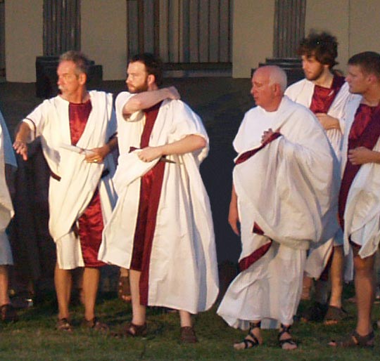 same photo of group with two people removed