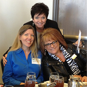 Beth Shearon of SeeMe Digital with Missy and Lisa at the Greater Enid Chamber of Commerce November Noon Network, at the Enid Convention Hall